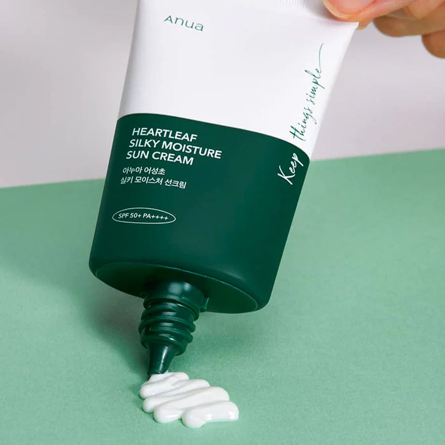 Anua hydrating SPF50 sun cream Heartleaf silky moisture sun cream tube squeezing white cream