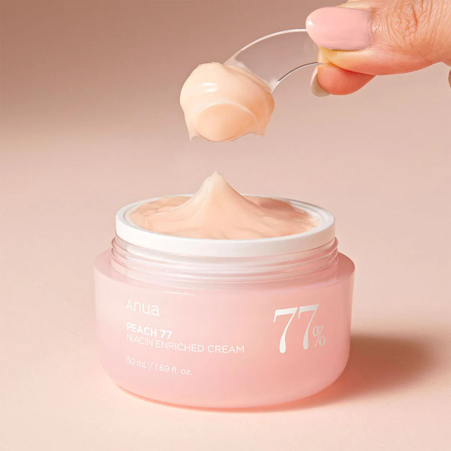 Anua Peach 77% Maqui-in Enriched Cream best Asian skincare moisturizer in pink jar with cream scoop