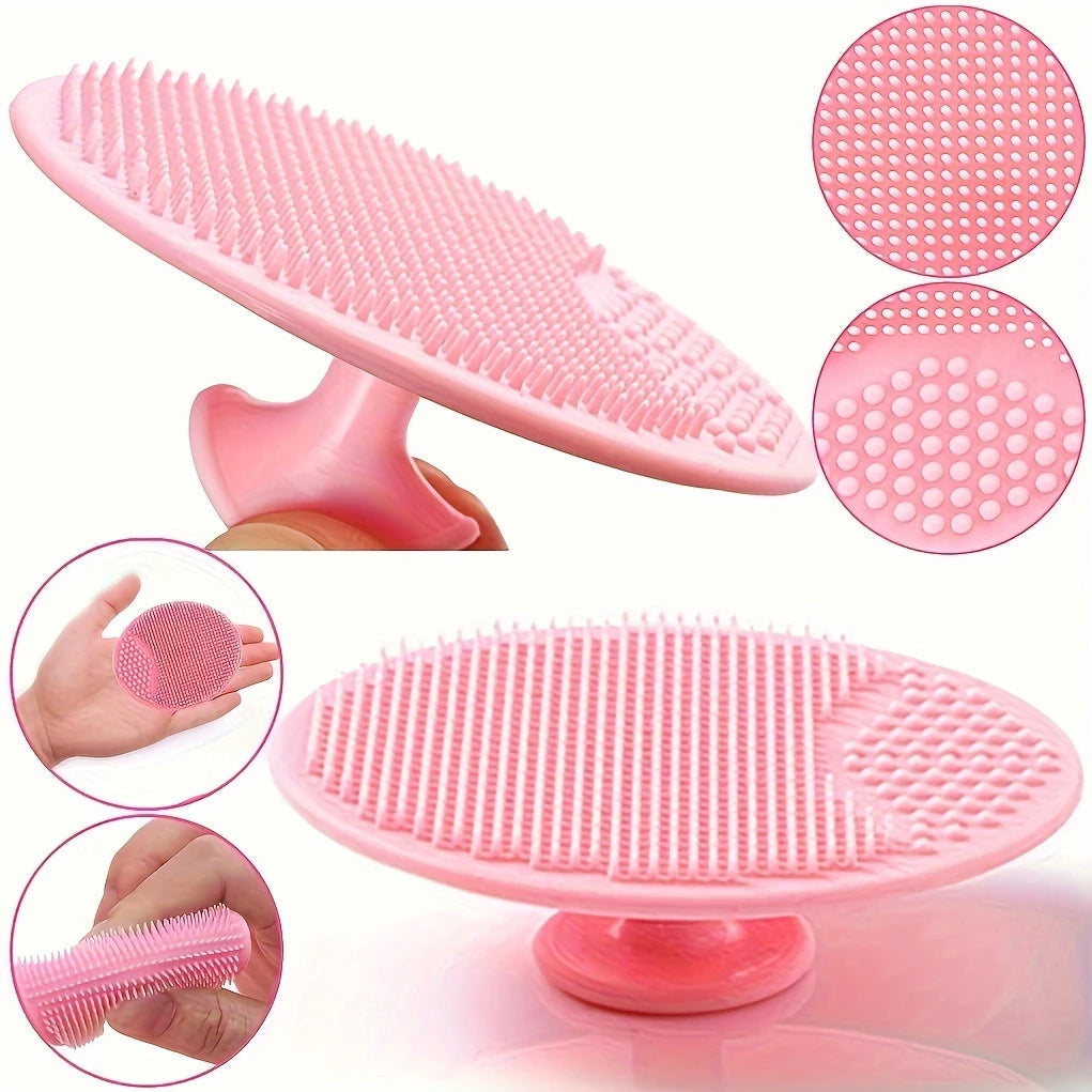 Zuzu Aura pink gentle facial cleansing tool with soft silicone bristles and ergonomic handle