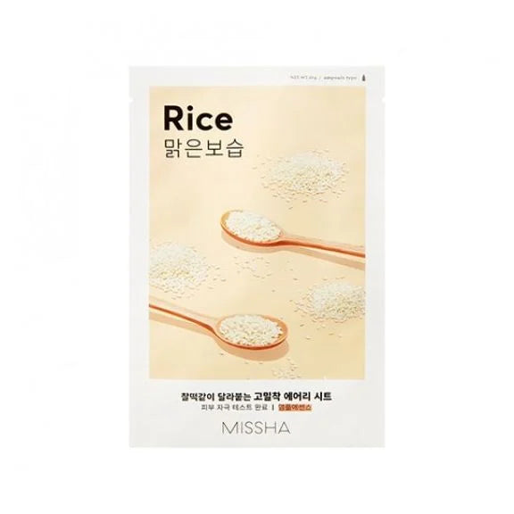 MISSHA brightening rice facial mask sheet with rice grains and wooden spoons on beige background