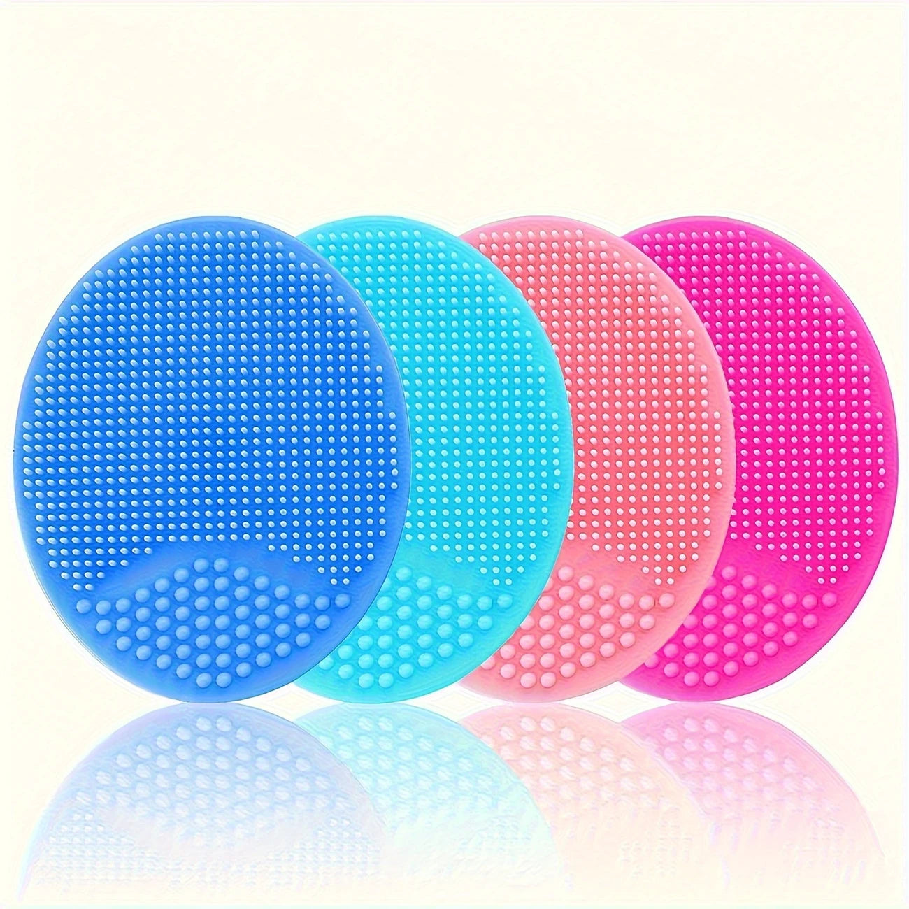 Zuzu Aura gentle facial cleansing tool set in blue turquoise pink and magenta silicone pads