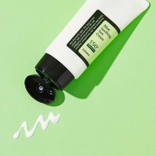 Cosrx aloe sun cream for sensitive skin with SPF 50 plus PA plus in a white tube on green background
