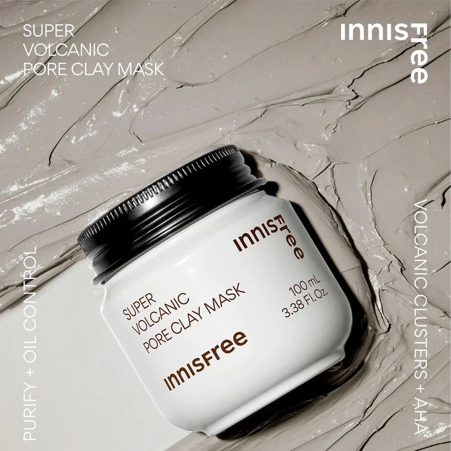 Innisfree Super Volcanic Pore Clay Mask jar on gray clay background best clay mask for oily skin