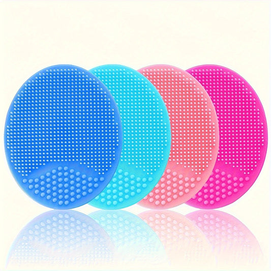 Zuzu Aura gentle facial cleansing tool set in blue turquoise pink and magenta silicone pads